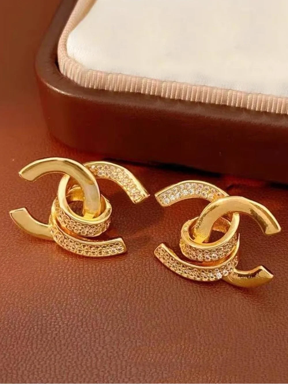 Gold Interlocking Crystal Stud Earrings – Elegant Luxury Statement Earrings